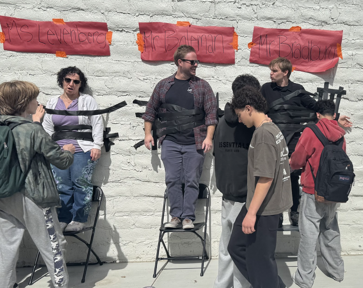 Sophomore class holds Tape a Teacher fundraiser